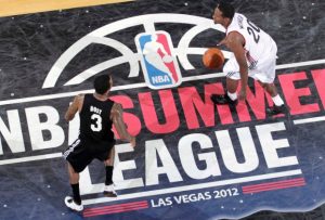 LAS VEGAS, NV - JULY 21: Kyle Weaver #20 fo the Miami Heat dribbles agaisnt Dee Bost #3 of the Portland Trail Blazers during NBA Summer League on July 21, 2012 at Cox Pavillion in Las Vegas, Nevada.  NOTE TO USER: User expressly acknowledges and agrees that, by downloading and/or using this Photograph, user is consenting to the terms and conditions of the Getty Images License Agreement. Mandatory Copyright Notice: Copyright 2012 NBAE (Photo by Jack Arent/NBAE via Getty Images)